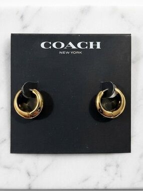 COACH
Signature Hallmark Tubular Huggies Earrings